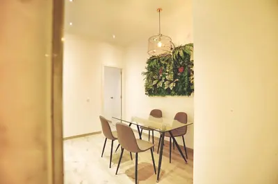 a dining room with a table and chairs at Dip2 in Barcelona