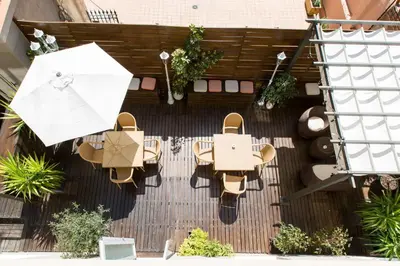 an overhead view of a patio with tables and chairs at Violeta Boutique in Barcelona
