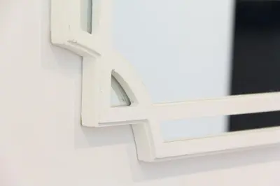 a white window latch on a white wall at Novus Homes Barcelona Collblanc in Hospitalet de Llobregat