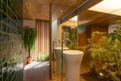 a bathroom with a tub and some plants at Petit Luxe Loft in Terrassa
