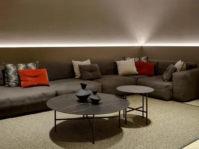 a living room with a couch and two tables at Musik Boutique Hotel - Solo Adultos in Barcelona
