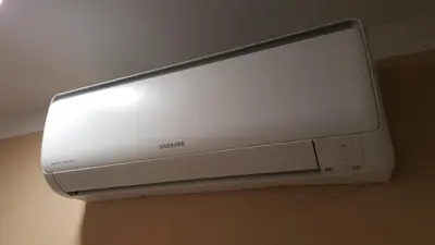 a computer monitor is hanging on a wall at Pensión Avenida in Vilafranca del Penedès
