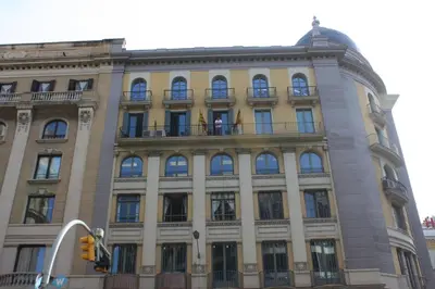 a large building with windows on the side of it at Pensión Casa Blanca in Barcelona