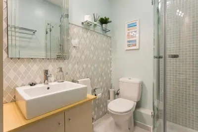 a bathroom with a sink and a toilet and a shower at Luxury & Elegant Apartment in the centre in Barcelona