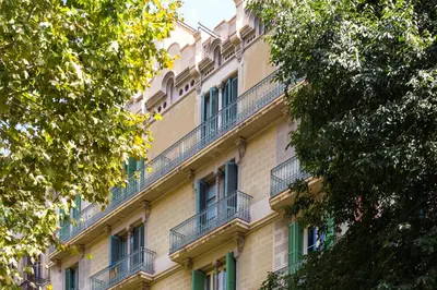 a building with balconies on the side of it at Quartprimera Apartments in Barcelona