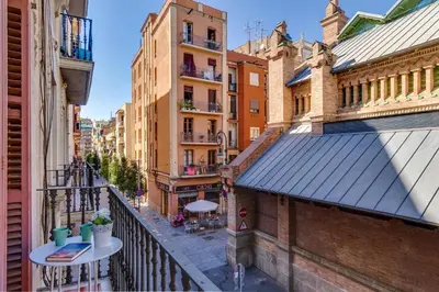 an apartment balcony with a view of buildings at Charming & Convenient Apartment Near Plaza Espanya in Barcelona