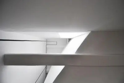 a white room with white ceilings and lights at Apartamento en Vilanova in Vilanova i la Geltrú