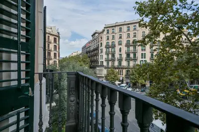 a balcony with a view of a street and buildings at Midtown Luxury Apartments by Sweett in Barcelona