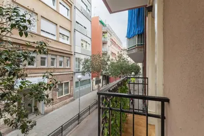 a view from a balcony of a street with buildings at Camp Nou , Fira Barcelona Apartment in Hospitalet de Llobregat