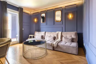 a living room with a couch and a table at TSA Gran Via in Barcelona