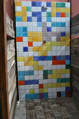 a colorful tiled shower in a bathroom at Entre Olivos: Very Charming Villa 18 SLEEPERS in Sant Pere de Ribes
