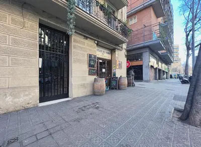 an empty street in front of a building at Stay U-nique Apartments Lepant in Barcelona