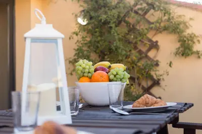a bowl of fruit sitting on top of a table at Matarolux15 in Mataró