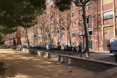 a city street with cars parked in front of buildings at New! Apartment for 3 people near Fira Gran Via in Hospitalet de Llobregat