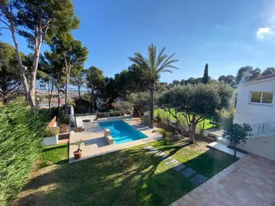 an aerial view of a backyard with a swimming pool at Villa Bella Vista in Castelldefels
