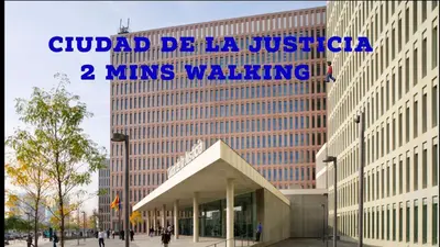 a building with a sign on the side of it at Practical room: Barcelona-Fira-Airport in Hospitalet de Llobregat
