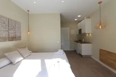 a kitchen with a counter top with appliances on it at Petit Bijou - Beach apartment III in Castelldefels