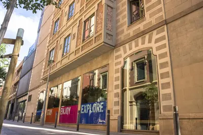 a store front of a building on a street at Urbany Hostel BCN GO! in Barcelona