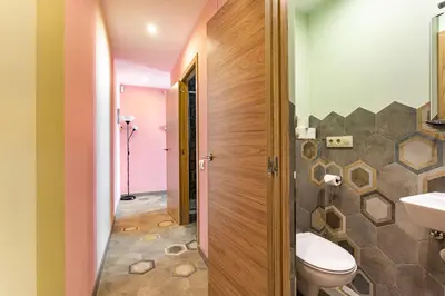 a bathroom with a toilet and a sink at Three bedrooms apartment in Barcelona