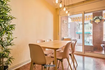 a conference room with a wooden table and chairs at Alcam Barbera Centro in Barbera del Valles