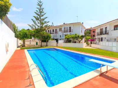 a swimming pool in the backyard of a house at Holiday Home Katy by Interhome in Cunit