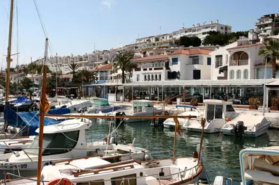 a bunch of boats are docked in a harbor at APARTAMENTO MARINERO, Vistas impresionantes. in Sitges