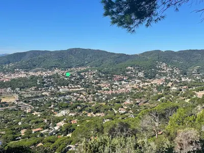 a view of a town on a mountain at Palm Maresme - Suite with bathroom and terrasse with ocean views in a private villa in Vilassar de Dalt