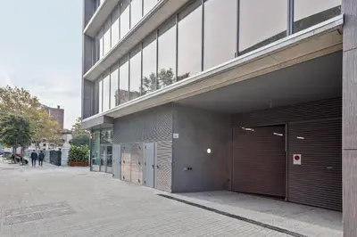a building with a large door on the side of it at Acta Voraport in Barcelona