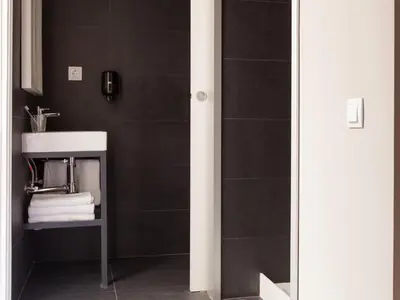 a bathroom with a sink and a shower at Ecozentric in Barcelona