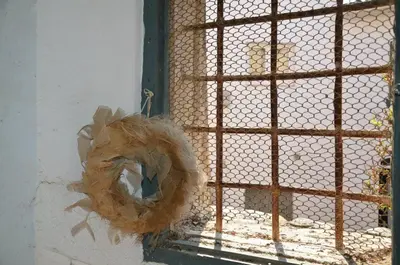 a window with a fence in front of it at RCP El Racó in Pacs del Penedes