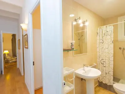 a bathroom with a sink and a toilet and a shower at Apartment Gracia Torrijos by Interhome in Barcelona