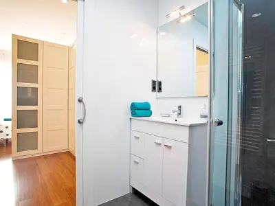 a bathroom with a sink and a shower at Apartment Eixample Esquerre Gran Via Balmes by Interhome in Barcelona