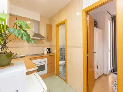 a small kitchen with a sink and a toilet at Apartment Eixample Dret Sagrada Familia by Interhome in Barcelona