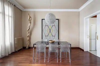 a dining room with a table and chairs at Barcelona Apartment Val in Barcelona