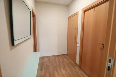 an empty room with a door and a hallway at Vallparadis apartment in Terrassa