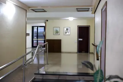 a hallway of a building with stairs and a door at Vallparadis apartment in Terrassa