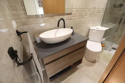 a bathroom with a sink and a toilet at Vallparadis apartment in Terrassa