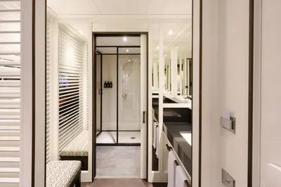 a bathroom with a walk in shower and a sink at Seventy Barcelona in Barcelona