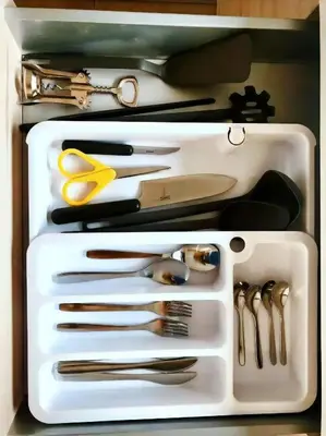 a white drawer filled with lots of kitchen utensils at Mon Residence Sant Jeroni in Manresa