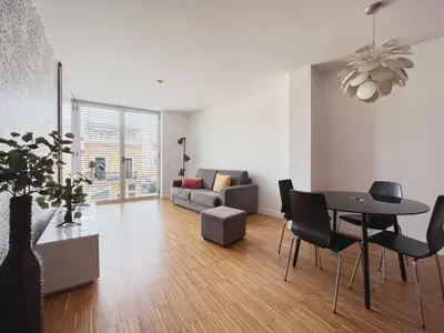 a living room with a table and a couch at Stay U-nique Apartments Pellaires in Barcelona