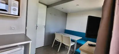 a small room with a table and two chairs at El Carlitos in Arenys de Mar