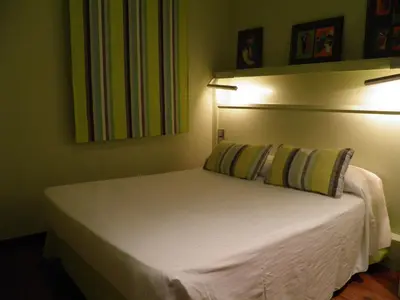 a bedroom with a large white bed in a room at Hotel Annex - Rey Don Jaime I in Barcelona