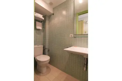a bathroom with a toilet and a sink at ClassBedroom Gothic Ramblas Apartments in Barcelona