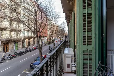 a view of a street from a balcony of a building at AB Passeig de Gràcia Còrsega in Barcelona
