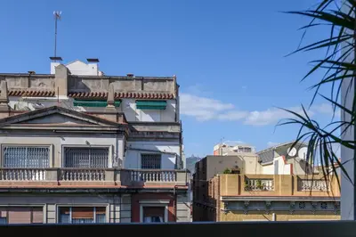 a group of buildings with balconies on top of them at RamblasRentals Stylish Bright 3BR New Catalan Flat 10m Ramblas - Parking - Wifi in Barcelona