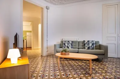 a living room with a couch and a coffee table at b42 - MODERNIST APARTMENT FOR LARGE GROUPS IN EIXAMPLE in Barcelona