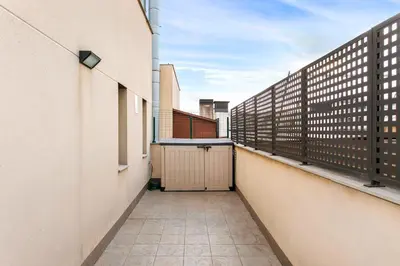 an empty balcony with a view of a building at Stay U-nique Apartments Plaça de Tetuan in Barcelona