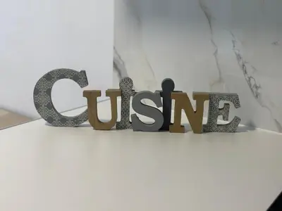 a sign that reads c visit in a white room at Beach apartment IV Coeur de Plage in Castelldefels