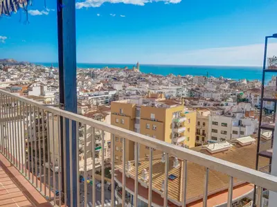 a view of a city from a balcony at Diamond by Hello Homes Sitges in Sitges
