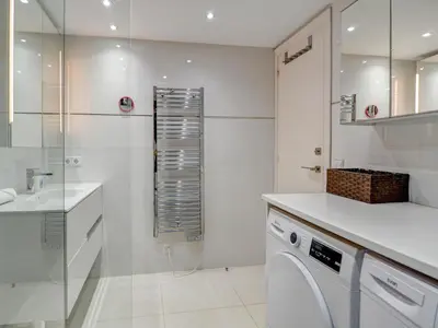 a white laundry room with a washing machine and a sink at Marina Duplex by Hello Homes Sitges in Sitges